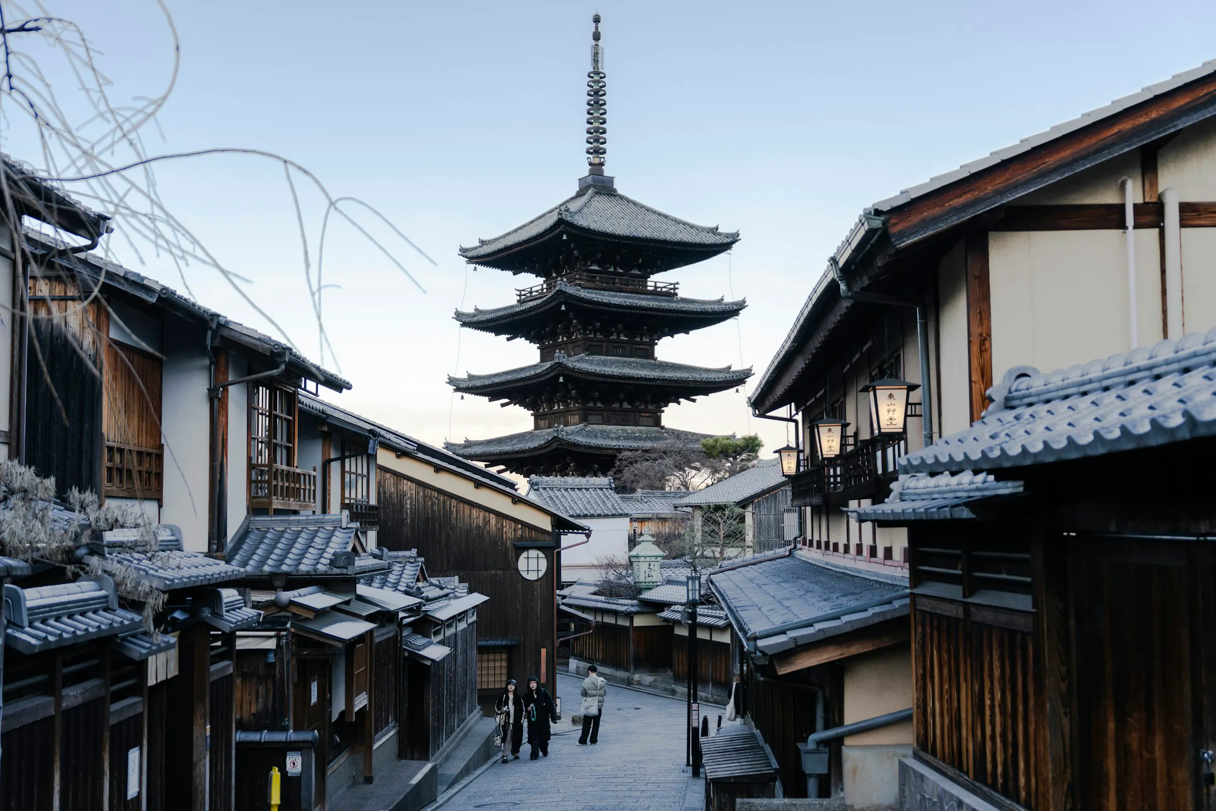 A traditional Kyoto street leading to a pagoda
