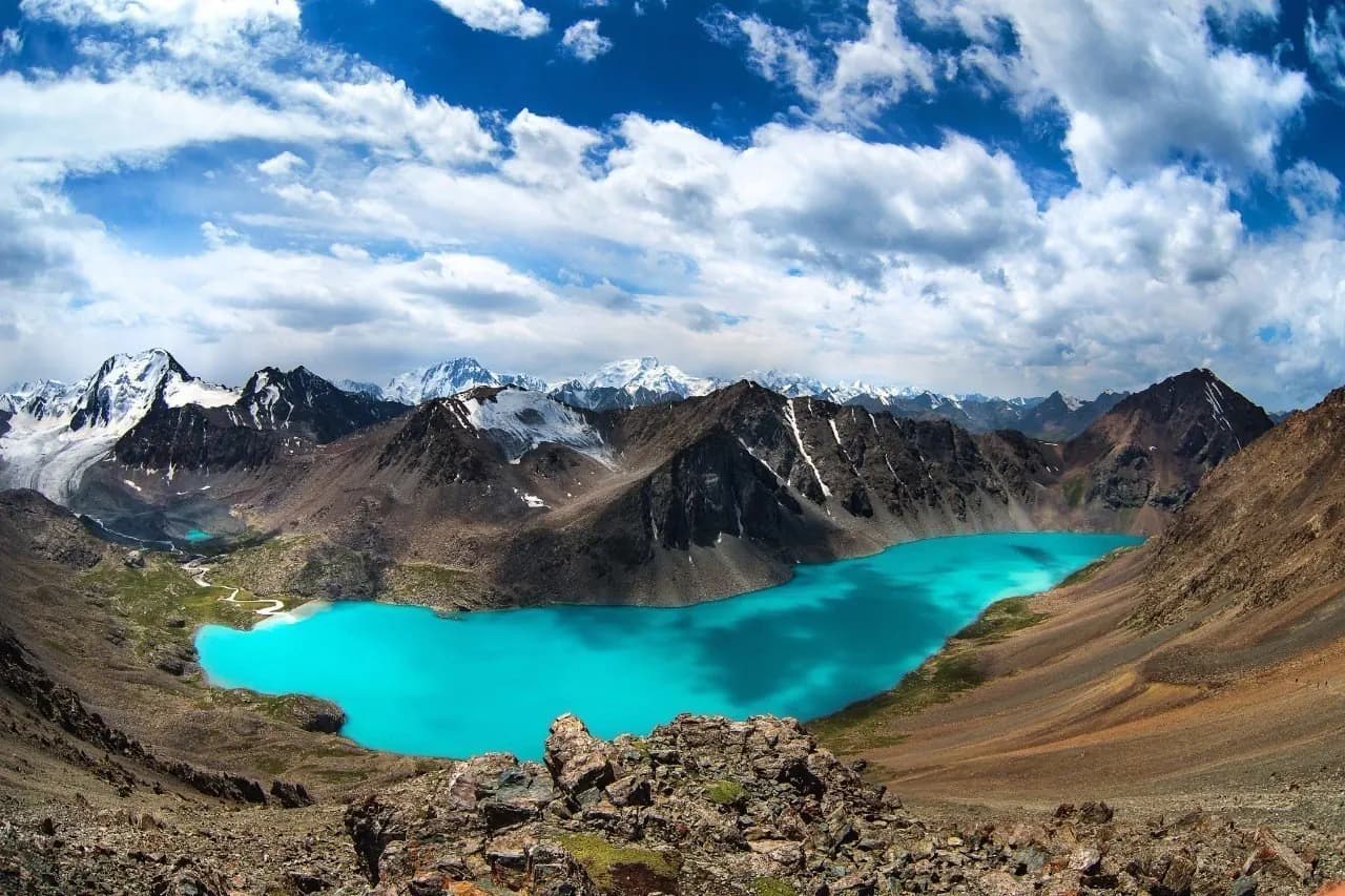 Ala-Kul Lake surrounded by high mountains